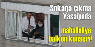 İzmir’de Sokağa çıkma Yasağında, mahalleliye balkondan moral konseri